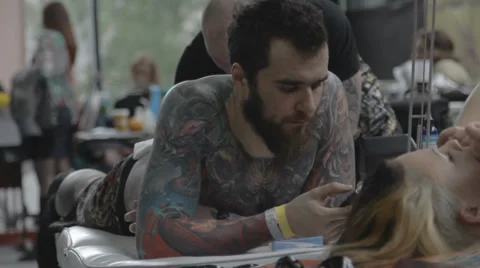 Tattooist making of tattoo Stock Footage 39558359
