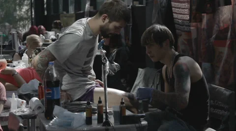 Tattooist making of tattoo Stock Footage 39558374