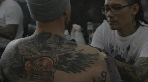 Tattooist making of tattoo Stock Footage 39577329