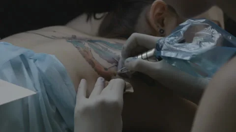 Tattooist making of tattoo Stock Footage 39577475