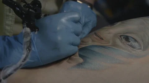 Tattooist making of tattoo Stock Footage 39577476