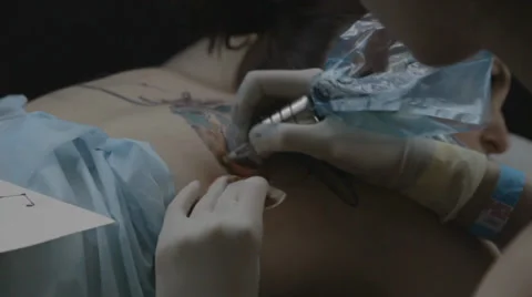 Tattooist making of tattoo Stock Footage 39577481