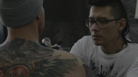Tattooist making of tattoo Stock Footage 39577490