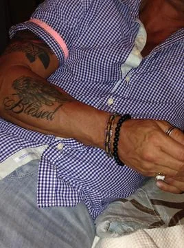 Tattoos on a man's arm Stock Photos