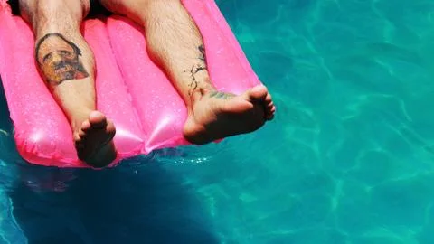 Tattos on the pool Stock Photos