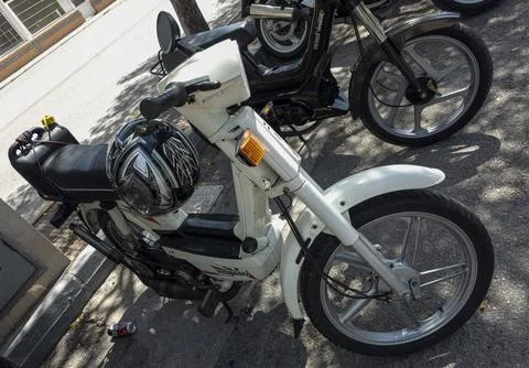 TAVERNES BLANQUES, SPAIN - JUNE 14, 2026.Classic white Vespino NL vintage m.. Stock Photos