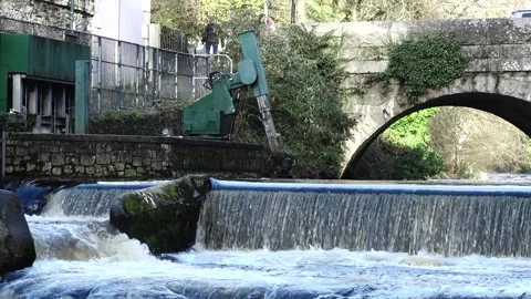Tavistock Devon England. The River Tavy, weir and debris scoop Stock Footage 131879403