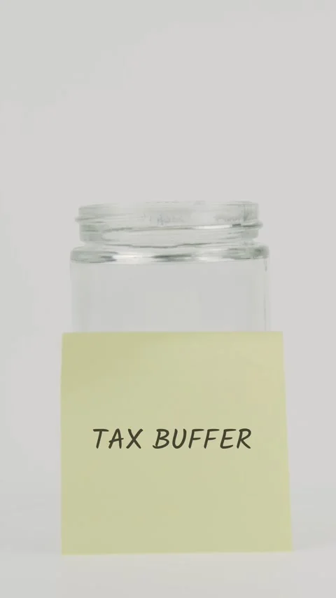 Tax buffer text or word on yellow sticky note attached to glass jar Stock Footage 311794971