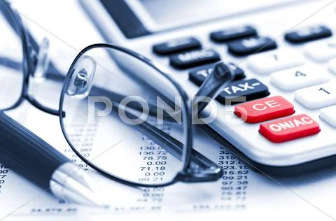 Tax calculator pen and glasses Stock Photos