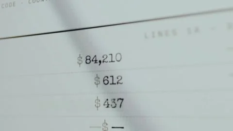 Tax document with itemized financial amounts per line entry Stock Footage 333415473