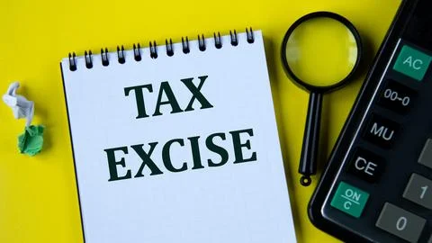 TAX EXCISE - words in a white notebook with a calculator and a magnifying g.. Stock Photos