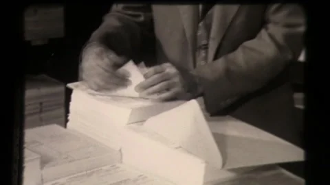 Tax Forms Being Sorted Taxes Papers Being Prepared for Federal Taxes IRS 1960 Stock Footage 130384774