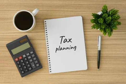 Tax planning written on notebook. Stock Photos