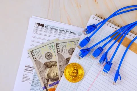 Tax preparation process with documents, cash, digital assets during tax pre.. Stock Photos