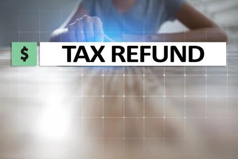 Tax refund text on virtual screen. Business and Finance concept. Stock Photos