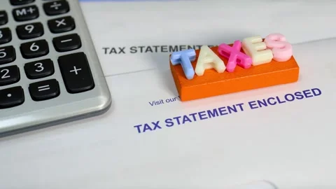 Tax statement document with calculator and letters Stock Footage 329660308