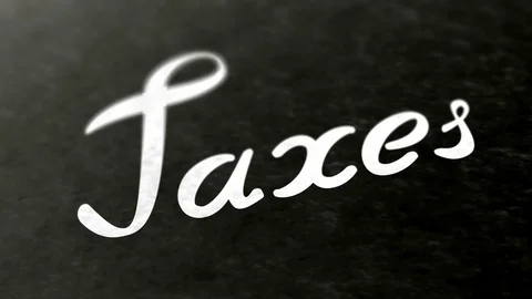 "Taxes" in the page. Negative image. Looping footage has 4K resolution. Stock Footage 98975767