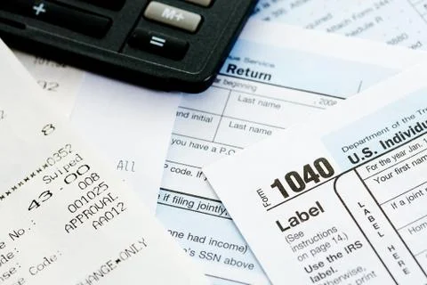 Taxes: tax forms and receipt Stock Photos