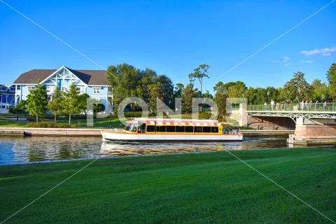 Taxi boat crossing the bridge at Lake Buena Vista area Stock Photos