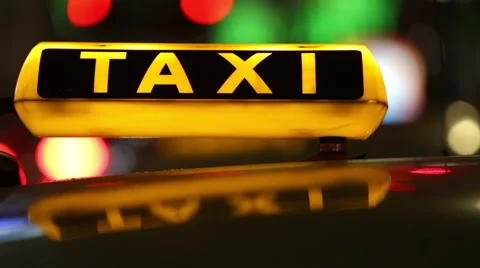 Taxi (Cab) driving with motion blur and city lights in 1080p FullHD Stock Footage 42638403