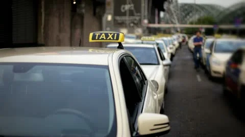 Taxi cabs lined up at station Stock Footage 11571328