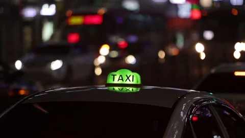 Taxi at night Stock Footage 76258575