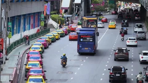 Taxi Queue and City Buses in Busy Bangkok Thailand Traffic Video stock 345719154