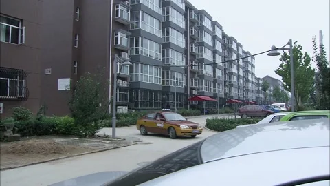 The taxi stopped at the gate of the unit Stock Footage 235279603