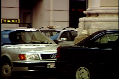 Taxis and a Carriage Stock Footage