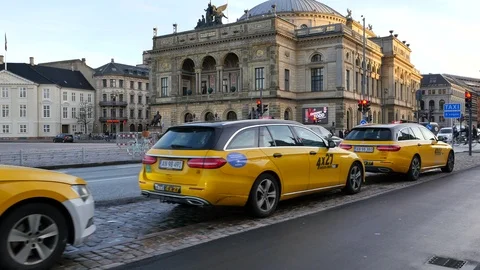 Taxis in front of the Royal Danish Theatre, Copenhagen Stock Footage