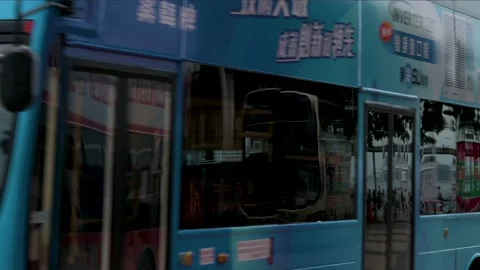 Taxis Queue at Tsim Sha Tsui Stand with Iconic Hong Kong Skyline and Bus Stock Footage 295368985