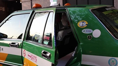 Taxis in Tokyo Stock Footage 100638094