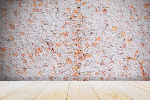 TBackground with empty wooden deck table over grunge cement wall, vintage Stock Photos