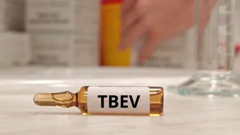 TBEV tick-borne encephalitis virus and active immunization concept injection Vídeo Stock 346728770