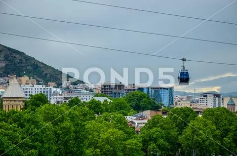 Tbilisi, Georgia - May 2018: Cableway with cable car over the park Stock Photos