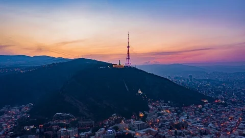 TBILISI HYPERLAPSE, Sunset over Mtatsminda mountain, shot with DJI Mavic 2 Pro d Video stock 125705383