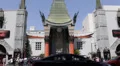 TCL Chinese Theatre Walk Fame Hollywood Boulevard Car Traffic Rush Hour Busy LA HD Footage