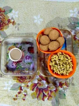 Tea and biscuits Stock Photos