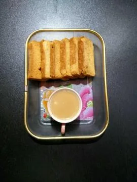 Tea and biscuits Stock Photos