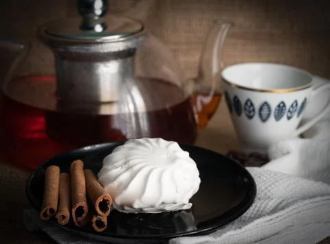 Tea and cake on the table Stock Photos