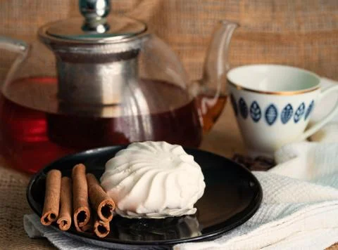 Tea and cake on the table Stock Photos