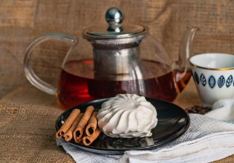 Tea and cake on the table Stock Photos