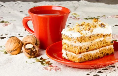 Tea and cake with walnuts Stock Photos