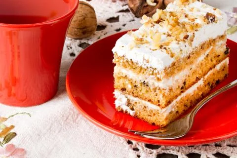 Tea and cake with walnuts Stock Photos