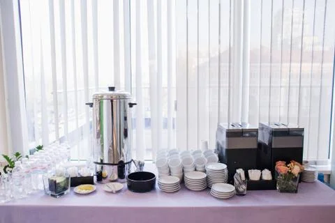 Tea and coffee machine on the buffet table Stock Photos