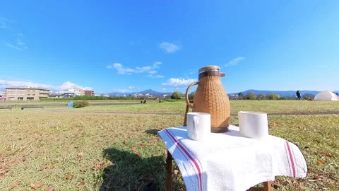 Tea and coffee by the side of Kamo river in Kyoto, Japan. Stock Footage 256363824