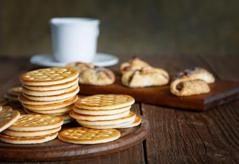 Tea and cookies on a rustic table Stock Photos