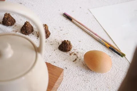 Tea and craft materials on a table Stock Photos
