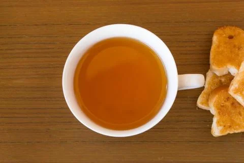 Tea and crispy garlic bread Stock Photos
