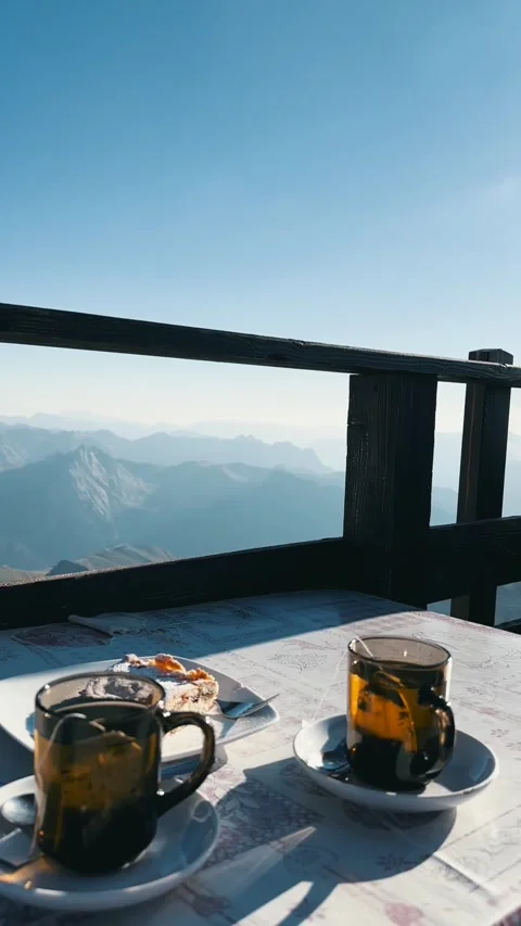 Tea and Dessert with Mountain View Stockbeeldmateriaal 329775863